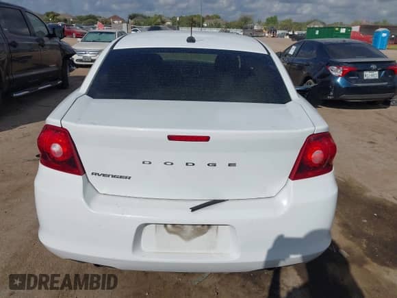 2014 Dodge Avenger SE with VIN 1C3CDZAGXEN219516, listed as a IAAI auction lot 43269201 with 82,987 mi miles and . Bid and sale history available at DreamBid. Image 17.