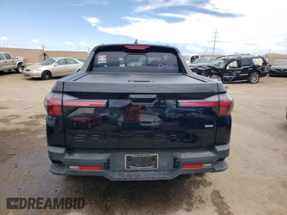 2023 Hyundai Santa Cruz SEL с VIN 5NTJCDAE1PH063541, выставлен на аукционе Copart как лот 61077744 с пробегом 20 862 миль миль и Списание • Salvage title. История ставок и продаж доступна на DreamBid. Изображение 6.