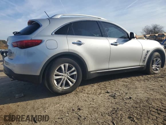 ✅ 2015 Infiniti QX70 • VIN: JN8CS1MW9FM482016 • Lot: 91623355. Listed on Copart with 126,685 mi. Free auction sales archive from the USA and detailed vehicle history report at DreamBid. Image 3.