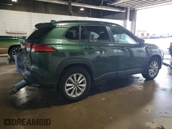 ✅ 2023 Toyota Corolla Cross LE • VIN: 7MUBAABG7PV054284 • Лот: 66846825. Опубликован ранее на Copart с пробегом 38 696 миль. Бесплатный доступ к архиву аукционных продаж из США и подробный отчёт об истории автомобиля на DreamBid. Изображение 3.