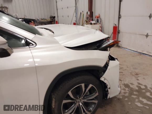 ✅ 2022 Lexus RX 350 • VIN: 2T2HZMDA6NC310908 • Лот: 43648693. Опубликован ранее на IAAI с пробегом 27 911 миль. Бесплатный доступ к архиву аукционных продаж из США и подробный отчёт об истории автомобиля на DreamBid. Изображение 6.