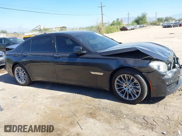 ✅ 2013 BMW 7 Series 750Li • VIN: WBAYE8C50DD131760 • Lot: 43531329. Listed on IAAI with 74,419 mi. Free auction sales archive from the USA and detailed vehicle history report at DreamBid. Image 13.