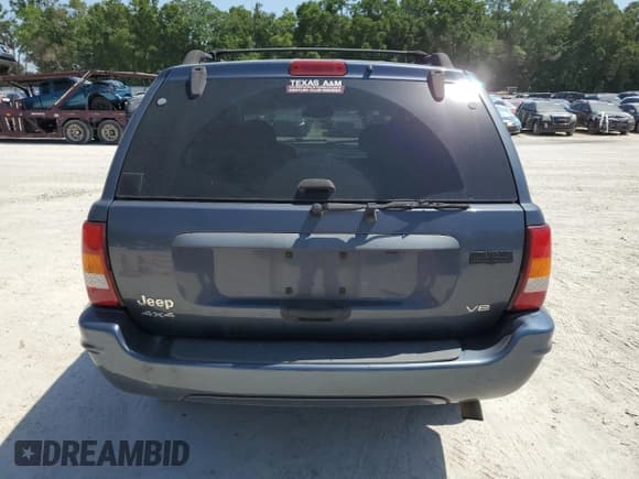 ✅ 2002 Jeep Grand Cherokee Laredo • VIN: 1J4GW48N72C252067 • Lot: 57414455. Listed on Copart with 133,429 mi. Free auction sales archive from the USA and detailed vehicle history report at DreamBid. Image 6.