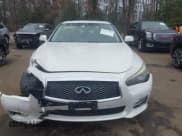 ✅ 2014 Infiniti Q50 Premium • VIN: JN1BV7AR7EM692504 • Lot: 43789438. Listed on IAAI with 104,772 mi. Free auction sales archive from the USA and detailed vehicle history report at DreamBid. Image 12.