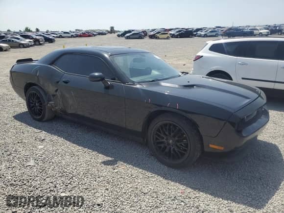 2014 Dodge Challenger SXT 100th Anniversary z VIN 2C3CDYAG9EH158498, wystawiony jako Copart lot #57096415 z przebiegiem 167 667 mil mil oraz Szkoda całkowita • Salvage title. Historia ofert i sprzedaży dostępna na DreamBid. Obrazek 4.