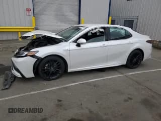 ✅ 2021 Toyota Camry Hybrid XSE • VIN: 4T1K31AK6MU561819 • Lot: 82128815. Listed on Copart with 82,712 mi. Free auction sales archive from the USA and detailed vehicle history report at DreamBid. Image 1.