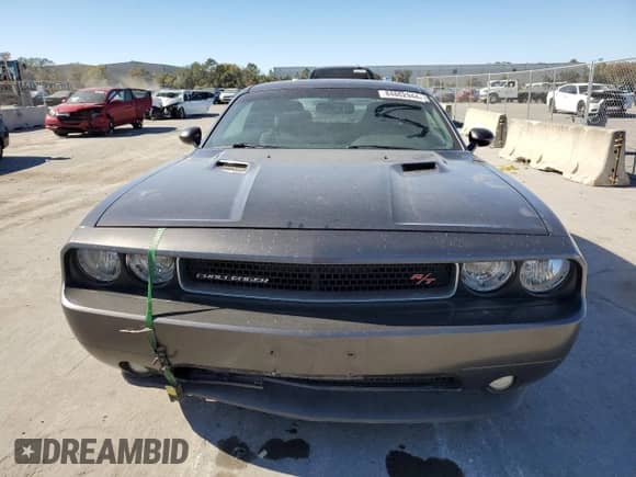 2014 Dodge Challenger R/T 100th Anniversary Appearance z VIN 2C3CDYBT7EH298612, wystawiony jako Copart lot #84862944 z przebiegiem 133 927 mil mil oraz Czysty tytuł • Clean title. Historia ofert i sprzedaży dostępna na DreamBid. Obrazek 5.