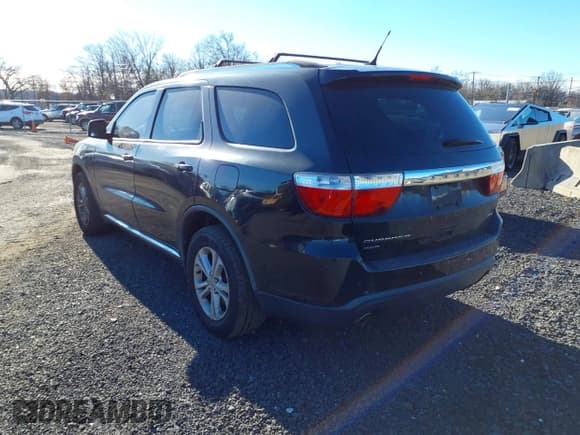 ✅ 2012 Dodge Durango Crew • VIN: 1C4SDJDT2CC104502 • Lot: 43857614. Listed on IAAI with 132,005 mi. Free auction sales archive from the USA and detailed vehicle history report at DreamBid. Image 3.