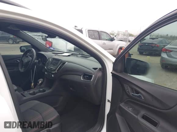 2024 Chevrolet Equinox RS with VIN 3GNAXMEG5RS112223, listed as a IAAI auction lot 43103626 with 26,235 mi miles and . Bid and sale history available at DreamBid. Image 5.