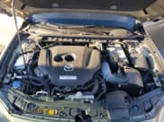 ✅ 2024 Mazda 3 Carbon Edition • VIN: JM1BPBYY5R1701991 • Lot: 84048414. Wystawiony na Copart z przebiegiem 8 109 mil. Bezpłatny archiwum sprzedaży aukcyjnych z USA i szczegółowy raport historii pojazdu na DreamBid. Zdjęcie 11.