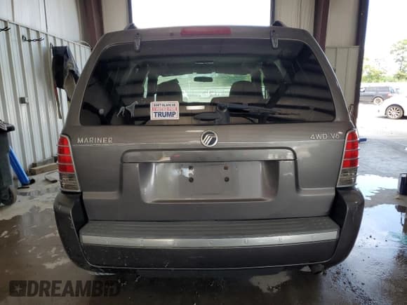 ✅ 2006 Mercury Mariner Luxury • VIN: 4M2YU57196KJ17893 • Лот: 66848295. Опубликован ранее на Copart с пробегом 128 080 миль. Бесплатный доступ к архиву аукционных продаж из США и подробный отчёт об истории автомобиля на DreamBid. Изображение 6.