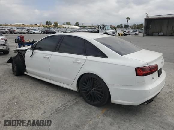 ✅ 2017 Audi A6 Prestige • VIN: WAUH2AFC4HN061710 • Лот: 48292035. Опубликован ранее на Copart с пробегом 104 484 миль. Бесплатный доступ к архиву аукционных продаж из США и подробный отчёт об истории автомобиля на DreamBid. Изображение 2.