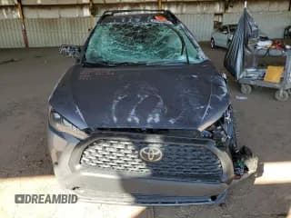 ✅ 2022 Toyota Corolla Cross LE • VIN: 7MUCAABG4NV033331 • Lot: 87089895. Listed on Copart with 75,491 mi. Free auction sales archive from the USA and detailed vehicle history report at DreamBid. Image 5.