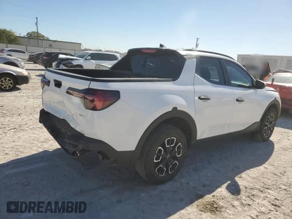 2023 Hyundai Santa Cruz SEL with VIN 5NTJCDAE8PH071054, listed as a Copart auction lot 81081134 with 9,609 mi miles and Salvage title. Bid and sale history available at DreamBid. Image 3.