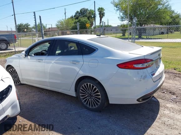 ✅ 2018 Ford Fusion Titanium • VIN: 3FA6P0D99JR124788 • Lot: 42789944. Listed on IAAI with 127,499 mi. Free auction sales archive from the USA and detailed vehicle history report at DreamBid. Image 14.