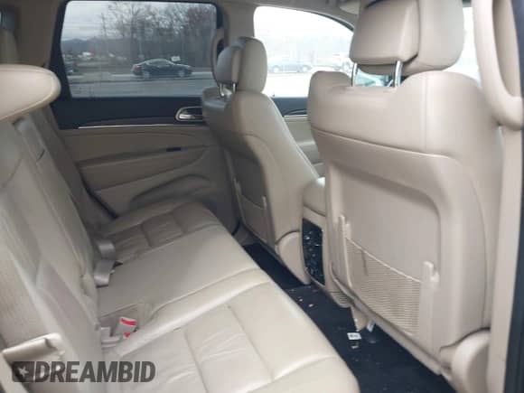 2016 Jeep Grand Cherokee Limited 75th Anniversary с VIN 1C4RJFBG7GC418453, выставлен на аукционе IAAI как лот 41546181 с пробегом 167 785 миль миль и . История ставок и продаж доступна на DreamBid. Изображение 8.