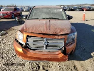✅ 2011 Dodge Caliber Mainstreet • VIN: 1B3CB3HA0BD262572 • Лот: 84053394. Опубликован ранее на Copart с пробегом Не указан. Бесплатный доступ к архиву аукционных продаж из США и подробный отчёт об истории автомобиля на DreamBid. Изображение 5.