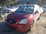 ✅ 2007 Kia Rondo EX • VIN: KNAFG526277118232 • Lot: 43857519. Listed on IAAI with 129,510 mi. Free auction sales archive from the USA and detailed vehicle history report at DreamBid. Image 2.