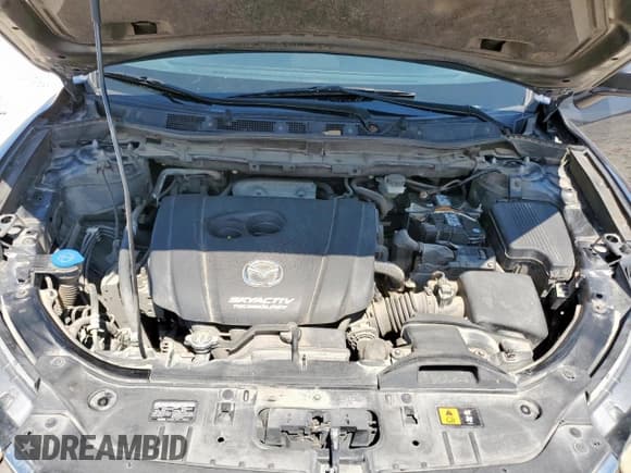 ✅ 2014 Mazda CX-5 Sport • VIN: JM3KE2BE5E0386119 • Lot: 68226855. Listed on Copart with 310,877 mi. Free auction sales archive from the USA and detailed vehicle history report at DreamBid. Image 12.