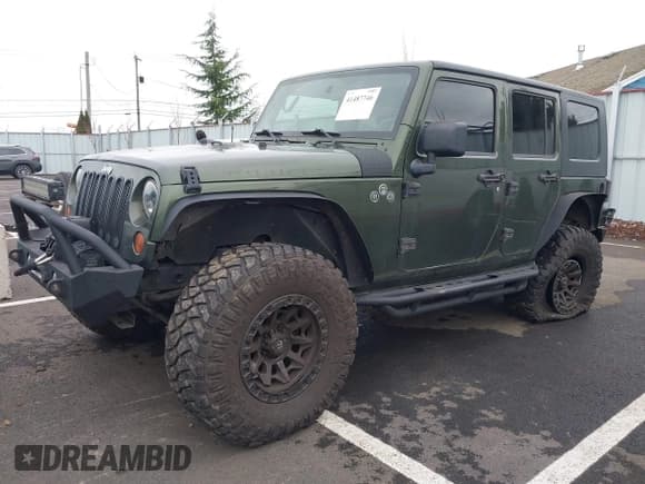 ✅ 2008 Jeep Wrangler Unlimited Rubicon • VIN: 1J8GA69168L591089 • Lot: 41487746. Listed on IAAI with 161,916 mi. Free auction sales archive from the USA and detailed vehicle history report at DreamBid. Image 2.