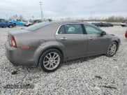 ✅ 2011 Chevrolet Malibu LTZ • VIN: 1G1ZE5E74BF235554 • Lot: 80186244. Listed on Copart with 177,829 mi. Free auction sales archive from the USA and detailed vehicle history report at DreamBid. Image 3.