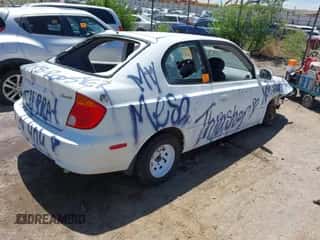 2005 Hyundai Accent GLS z VIN KMHCG35C25U326651, wystawiony jako IAAI lot #42582426 z przebiegiem Nie podano mil oraz . Historia ofert i sprzedaży dostępna na DreamBid. Obrazek 4.