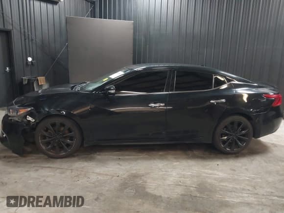 ✅ 2016 Nissan Maxima S • VIN: 1N4AA6AP4GC436297 • Lot: 42493000. Listed on IAAI with 167,097 mi. Free auction sales archive from the USA and detailed vehicle history report at DreamBid. Image 14.