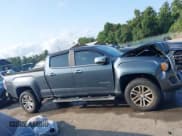 ✅ 2015 GMC Canyon 4WD SLT • VIN: 1GTG6CE31F1214936 • Lot: 42950344. Listed on IAAI with 165,149 mi. Free auction sales archive from the USA and detailed vehicle history report at DreamBid. Image 13.