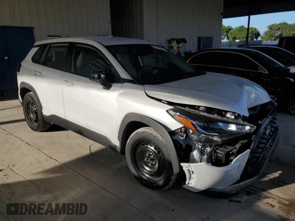 ✅ 2022 Toyota Corolla Cross L • VIN: 7MUAAAAG4NV020474 • Lot: 87018265. Listed on Copart with 29,372 mi. Free auction sales archive from the USA and detailed vehicle history report at DreamBid. Image 4.