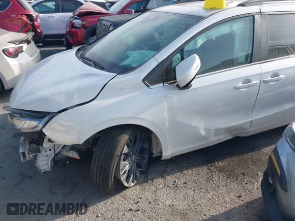 ✅ 2025 Honda Odyssey Touring • VIN: 5FNRL6H83SB005645 • Lot: 43507137. Listed on IAAI with 6,051 mi. Free auction sales archive from the USA and detailed vehicle history report at DreamBid. Image 2.