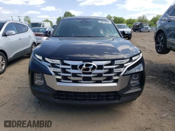 2022 Hyundai Santa Cruz SEL with VIN 5NTJBDAE9NH015673, listed as a Copart auction lot 66458554 with 15,874 mi miles and Salvage title. Bid and sale history available at DreamBid. Image 5.