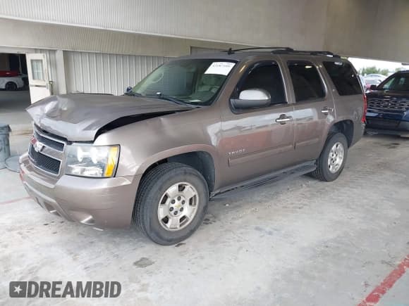 ✅ 2014 Chevrolet Tahoe LT • VIN: 1GNSCBE09ER193327 • Lot: 43187109. Listed on IAAI with 168,647 mi. Free auction sales archive from the USA and detailed vehicle history report at DreamBid. Image 2.