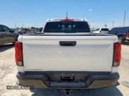 ✅ 2024 Chevrolet Colorado 4WD Trail Boss • VIN: 1GCPTEEK8R1193700 • Лот: 65854785. Опубликован ранее на Copart с пробегом 28 856 миль. Бесплатный доступ к архиву аукционных продаж из США и подробный отчёт об истории автомобиля на DreamBid. Изображение 6.