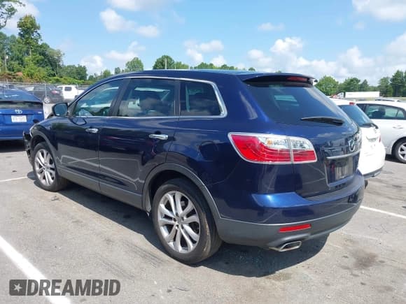 ✅ 2012 Mazda CX-9 Grand Touring • VIN: JM3TB2DA3C0352412 • Lot: 42813832. Wystawiony na IAAI z przebiegiem 180 961 mil. Bezpłatny archiwum sprzedaży aukcyjnych z USA i szczegółowy raport historii pojazdu na DreamBid. Zdjęcie 3.