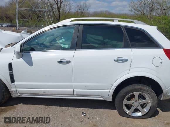✅ 2013 Chevrolet Captiva Sport LT • VIN: 3GNAL3EKXDS613580 • Lot: 42024623. Wystawiony na IAAI z przebiegiem 81 787 mil. Bezpłatny archiwum sprzedaży aukcyjnych z USA i szczegółowy raport historii pojazdu na DreamBid. Zdjęcie 14.