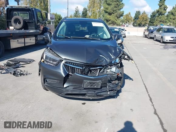 ✅ 2018 Buick Encore Essence • VIN: KL4CJGSB1JB532701 • Lot: 43462038. Listed on IAAI with Not provided. Free auction sales archive from the USA and detailed vehicle history report at DreamBid. Image 13.