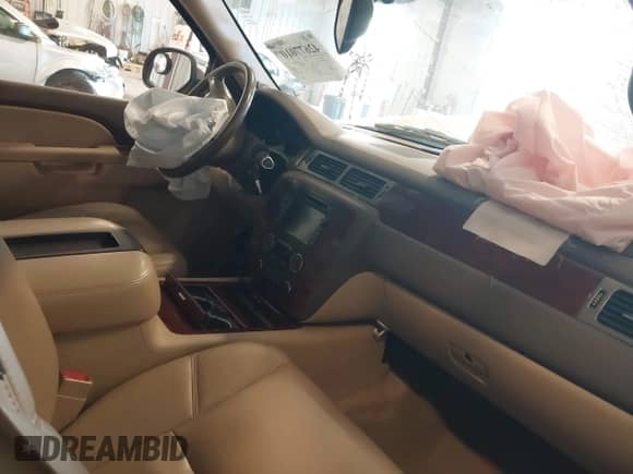 2011 Chevrolet Tahoe LTZ with VIN 1GNSKCE03BR311926, listed as a IAAI auction lot 42677010 with 150,432 mi miles and . Bid and sale history available at DreamBid. Image 5.