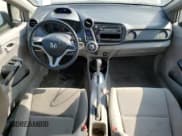 ✅ 2013 Honda Insight • VIN: JHMZE2H37DS004350 • Лот: 68494834. Опубликован ранее на Copart с пробегом 87 209 миль. Бесплатный доступ к архиву аукционных продаж из США и подробный отчёт об истории автомобиля на DreamBid. Изображение 8.