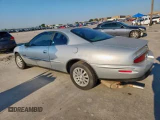 ✅ 1997 Buick Riviera • VIN: 1G4GD2211V4705731 • Lot: 70320995. Wystawiony na Copart z przebiegiem Nie podano. Bezpłatny archiwum sprzedaży aukcyjnych z USA i szczegółowy raport historii pojazdu na DreamBid. Zdjęcie 2.
