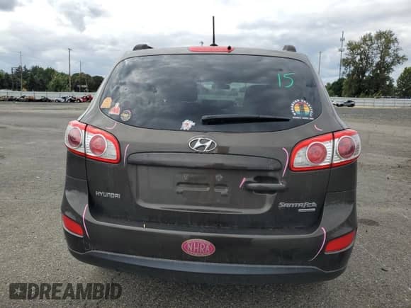 2011 Hyundai Santa Fe GLS с VIN 5XYZGDAB4BG067062, выставлен на аукционе Copart как лот 68022214 с пробегом 110 447 миль миль и Списание • Salvage title. История ставок и продаж доступна на DreamBid. Изображение 6.