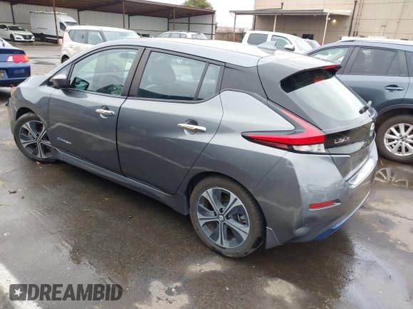 ✅ 2018 Nissan LEAF SV • VIN: 1N4AZ1CP2JC304719 • Лот: 41629796. Опубликован ранее на IAAI с пробегом 49 806 миль. Бесплатный доступ к архиву аукционных продаж из США и подробный отчёт об истории автомобиля на DreamBid. Изображение 3.