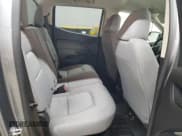 ✅ 2021 Chevrolet Colorado 4WD Work Truck • VIN: 1GCGTBEN5M1146402 • Лот: 88408785. Опубликован ранее на Copart с пробегом 89 848 миль. Бесплатный доступ к архиву аукционных продаж из США и подробный отчёт об истории автомобиля на DreamBid. Изображение 11.