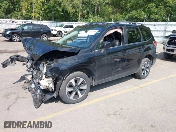 2018 Subaru Forester Limited with VIN JF2SJAJC1JH402361, listed as a IAAI auction lot 43173408 with Not provided miles and . Bid and sale history available at DreamBid. Image 2.