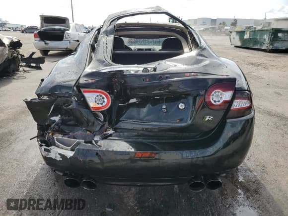 ✅ 2011 Jaguar XK XKR • VIN: SAJWA4DCXBMB39622 • Lot: 79881914. Listed on Copart with 61,163 mi. Free auction sales archive from the USA and detailed vehicle history report at DreamBid. Image 6.