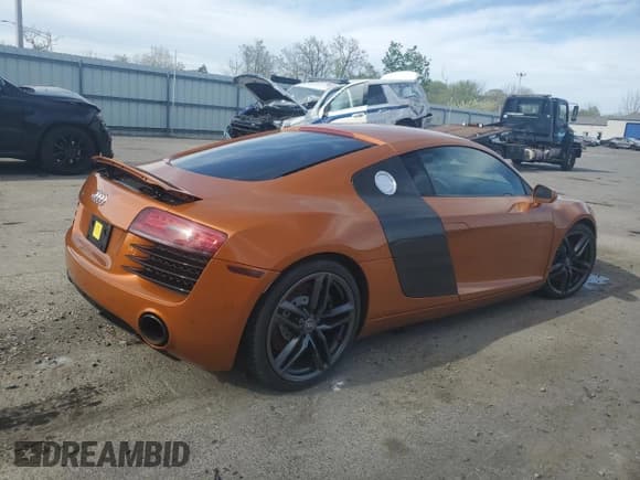 ✅ 2014 Audi R8 • VIN: WUAAUAFG4EN002088 • Лот: 46643655. Опубликован ранее на Copart с пробегом 43 012 миль. Бесплатный доступ к архиву аукционных продаж из США и подробный отчёт об истории автомобиля на DreamBid. Изображение 3.