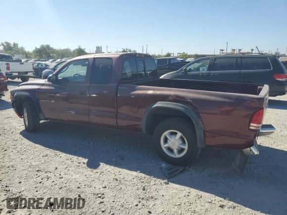 2000 Dodge Dakota with VIN 1B7GL22X6YS690056, listed as a Copart auction lot 76450734 with 261,486 mi miles and Salvage title. Bid and sale history available at DreamBid. Image 2.