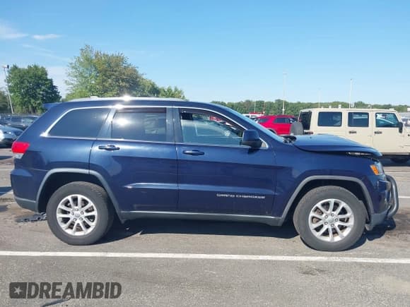 ✅ 2015 Jeep Grand Cherokee Altitude • VIN: 1C4RJFAG5FC602760 • Lot: 43206715. Wystawiony na IAAI z przebiegiem 77 685 mil. Bezpłatny archiwum sprzedaży aukcyjnych z USA i szczegółowy raport historii pojazdu na DreamBid. Zdjęcie 13.
