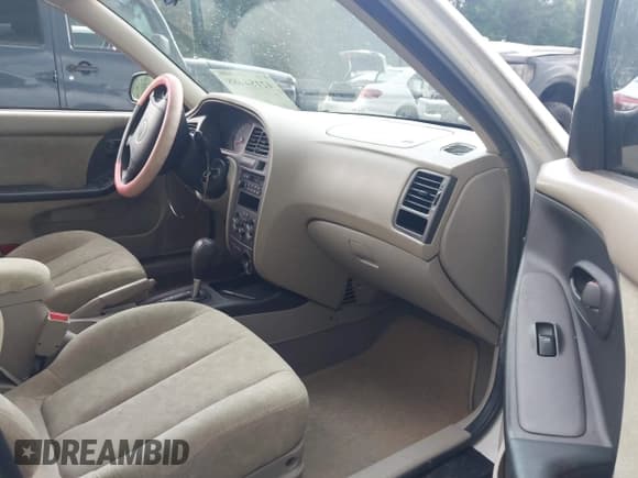 ✅ 2003 Hyundai Elantra GLS • VIN: KMHDN45D63U615750 • Lot: 42184488. Wystawiony na IAAI z przebiegiem 76 485 mil. Bezpłatny archiwum sprzedaży aukcyjnych z USA i szczegółowy raport historii pojazdu na DreamBid. Zdjęcie 5.