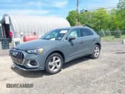 ✅ 2022 Audi Q3 Premium • VIN: WA1AUCF38N1031553 • Lot: 42233049. Listed on IAAI with 18,110 mi. Free auction sales archive from the USA and detailed vehicle history report at DreamBid. Image 2.