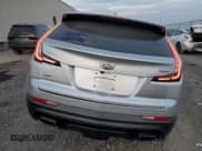✅ 2021 Cadillac XT4 AWD Sport • VIN: 1GYFZFR46MF043456 • Лот: 83324124. Опубликован ранее на Copart с пробегом 59 785 миль. Бесплатный доступ к архиву аукционных продаж из США и подробный отчёт об истории автомобиля на DreamBid. Изображение 6.